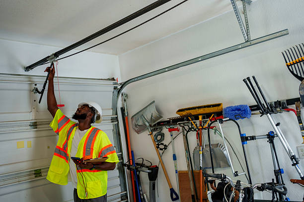 Professional Garage Door Panel Replacement technician working in Dike, IA